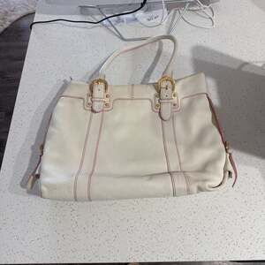 Dooney & Bourke Cream Pebbled Leather Tote with Pink Edging and Gold Buckles